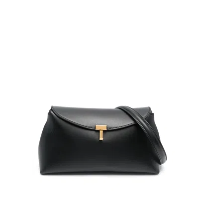 Totême T-lock Leather Clutch Bag In Black