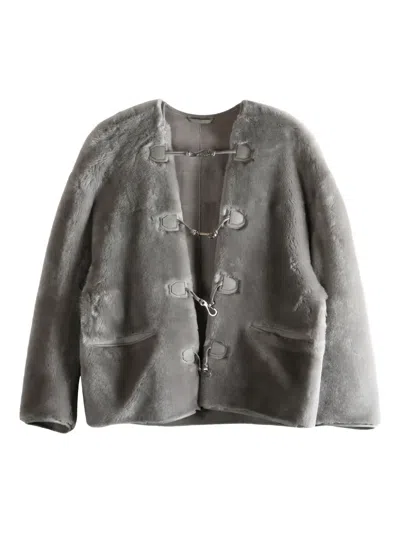 Totême Toggle-fastening Shearling Jacket In Gray