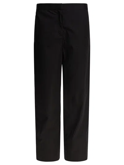 Totême Twisted Seam Tailored Pants In Black