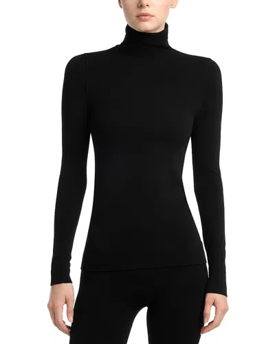 Totême Turtleneck Long Sleeve Jersey Tee In Black