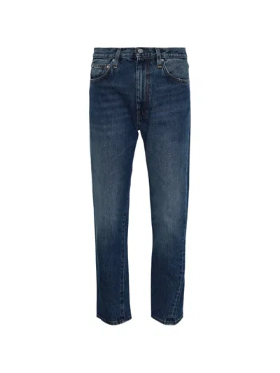 Totême Twisted Seam Jeans In Blue