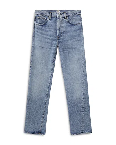 Totême Twisted Seam Jeans In Worn Blue