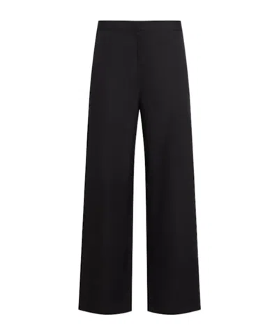 Totême Twisted Seam Organic Cotton Pants In Black