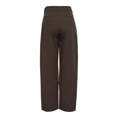 Totême Twisted Tailored Trousers In Burgundy
