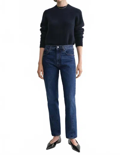 Totême Vintage Medium Rise Twisted Seam Pants In Blue