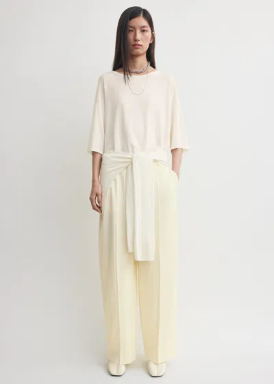 Totême Wide Fluid Trousers Ecru In Sand
