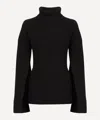Totême Ribbed-knit Wool Turtleneck Sweater In Black