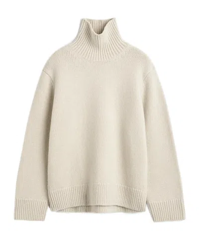 Totême Wool High-neck Top With An Almond-shaped Neckline In Animal Print