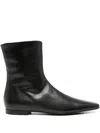 Totême Zipped Leather Boots In Black