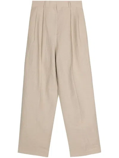 Totême Pleat-detail Tapered Trousers In Beige