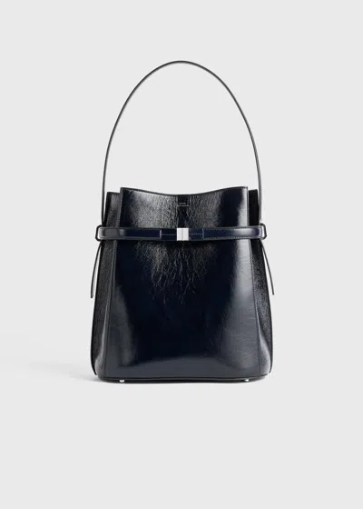 Totême Belted Naplack-leather Bucket Bag Navy In Brown