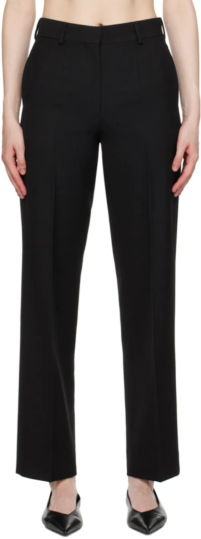 Totême Toteme Flared Tailored Trousers In 001 Black