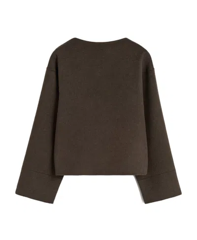 Totême Wool Long-sleeved Sweater In Black