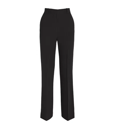 Totême Crepe Flared Trousers In Black