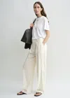 Totême Double-pleat Fluid Trousers Ecru In Ecru