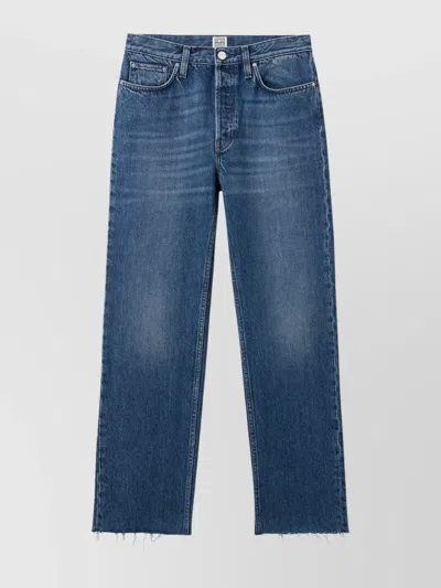 Totême High-rise Denim With Frayed Hem And Flap In Blue