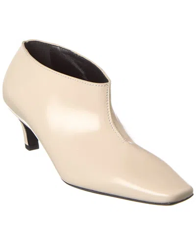 Totême The Wide Shaft Glossed-leather Ankle Boots In Beige