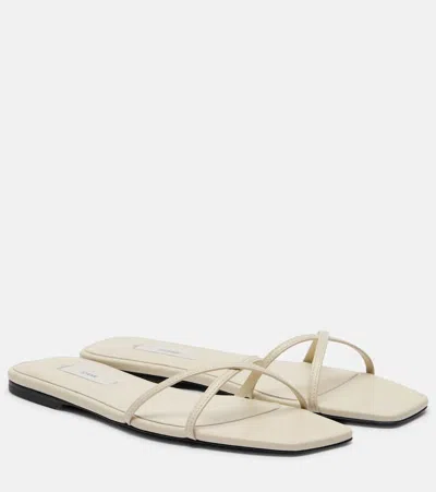 TOTÊME LEATHER SLIDES