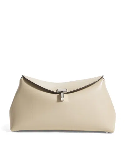 Totême Leather T-lock Clutch Bag In Beige