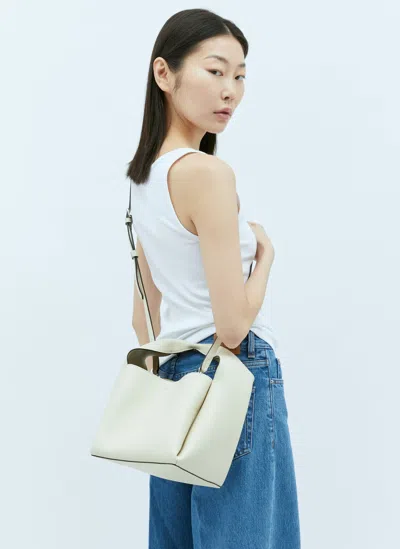 Totême Logo Print Leather Bucket Bag In White