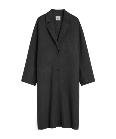 Totême Long-sleeved Wool Coat In Black