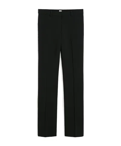 Totême Low-rise Wool Trousers In Black