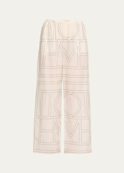 Totême Monogram Silk Straight-leg Ankle Pajama Pants In Brown
