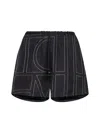 Totême Toteme Monogram Silk Shorts