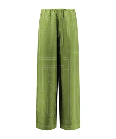 Totême Monogram Silk Pajama Bottoms In Yellow