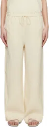 Totême Off-white Woven Stripe Drawstring Trousers In Ecru 116