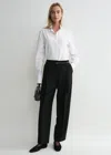 Totême Low-rise Stovepipe Trousers In Black