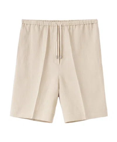 Totême Pressed-crease Shorts In Nude