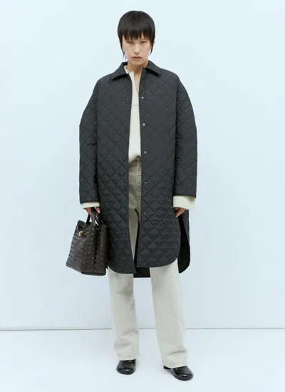 Totême Quilted Cocoon Coat In Black