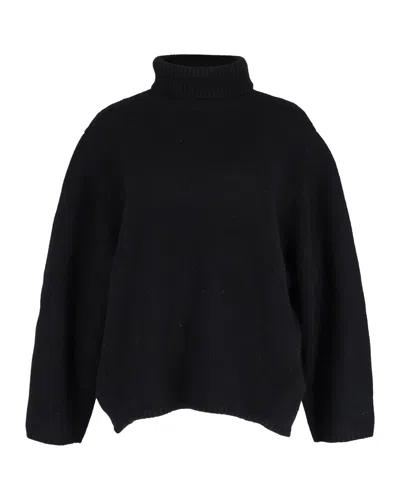 Totême Ribbed Turtleneck Sweater In Black Wool
