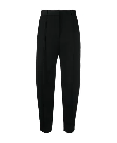 Totême Sewn Tapered Wool Trousers In Black