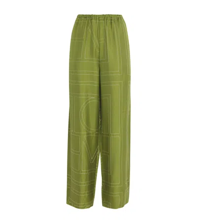 Totême Monogram Silk Pajama Bottoms In Yellow