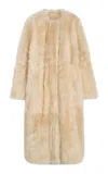 Totême Silky Shearling Long Coat In White