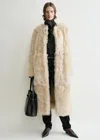 Totême Silky Shearling Long Coat In Eggnog