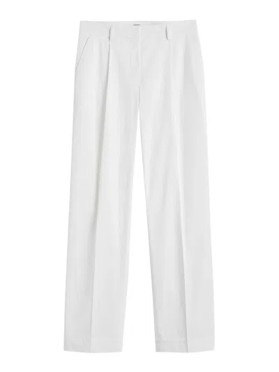Totême Slanted Pocket Trousers In White
