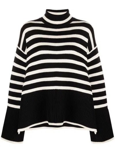 Totême Striped Wool Turtleneck Sweater In Black