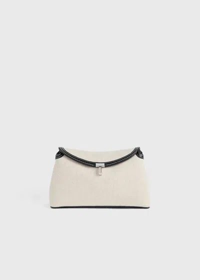Totême T-lock Canvas Clutch Ecru/black In Ecru,black