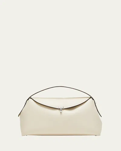 Totême T-lock Top Handle Bag In Pebble Grain Leather In Milk