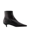 Totême Toteme Slim Ankle Boot Patent Black In Black