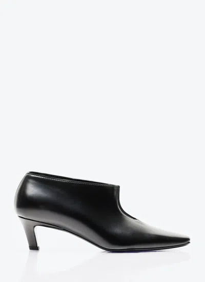 Totême The Wide Shaft Glossed-leather Ankle Boots In Black