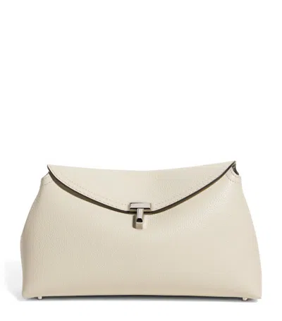 Totême T Lock Small Leather Clutch In Milk_grain