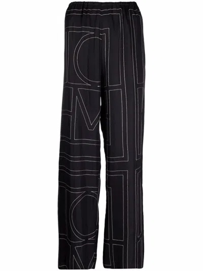 Totême Monogram Silk Pyjama Bottoms In Black
