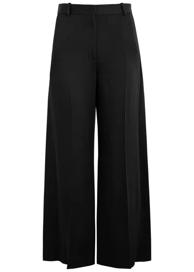 Totême Toteme Split-cuff Wide-leg Satin Trousers In Black