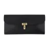 Totême Toteme T Lock Fold-over Leather Continental Wallet In Black