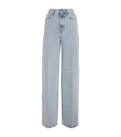 Totême Light Blue Wide Jeans With Logo Patch