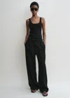Totême Woven Stripe Drawstring Trousers Black In Black